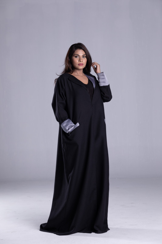 Blending of Design Linen and Sattin Makes the Pocket Model Abaya more casual. AB 1017